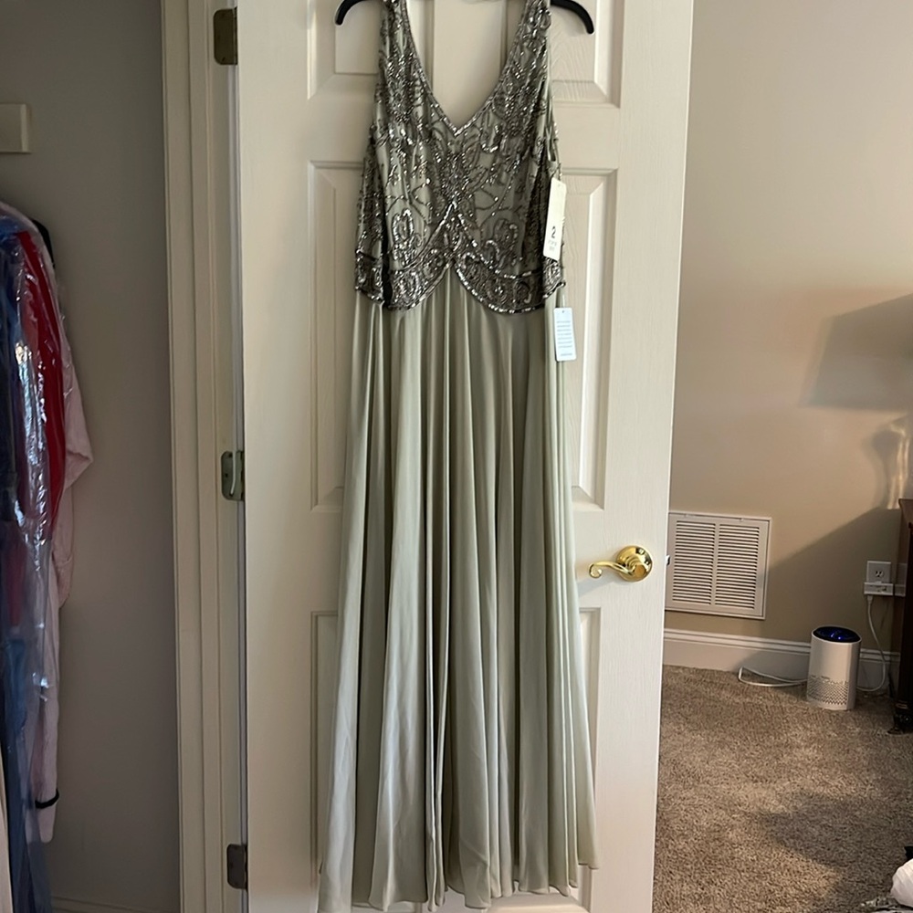 Evening gown. Size 18W. Light sage in color.